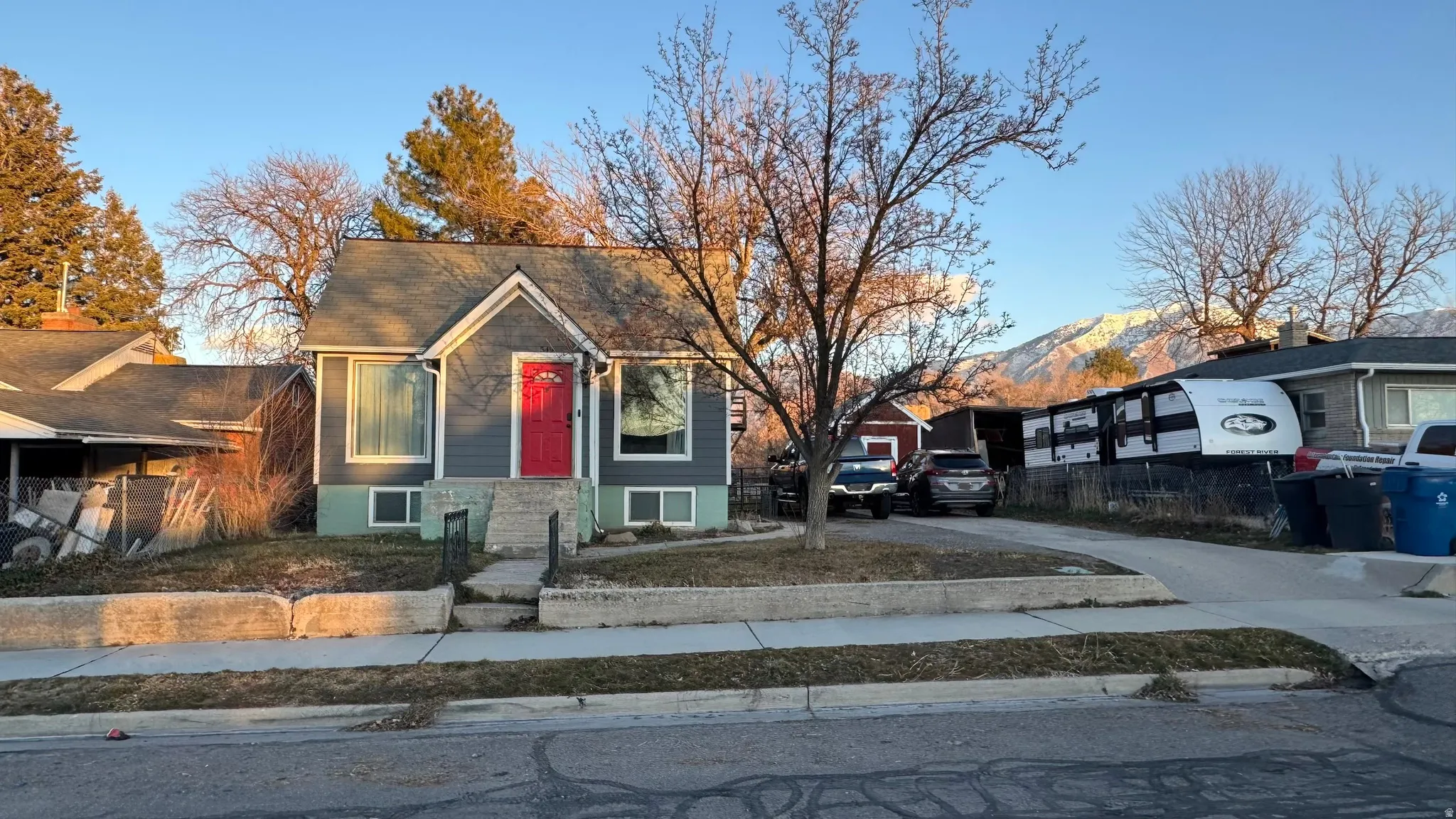 View of front facade featuring driveway and a mountain view