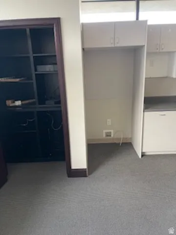 Interior space with light colored carpet