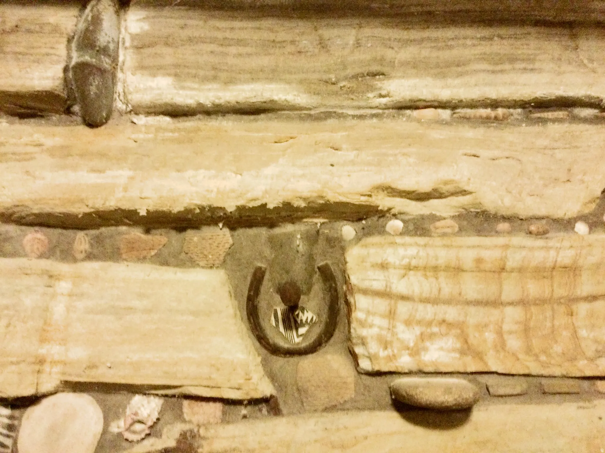 Detailed view of custom masonry walls. fun and interesting inclusions in the stone work.