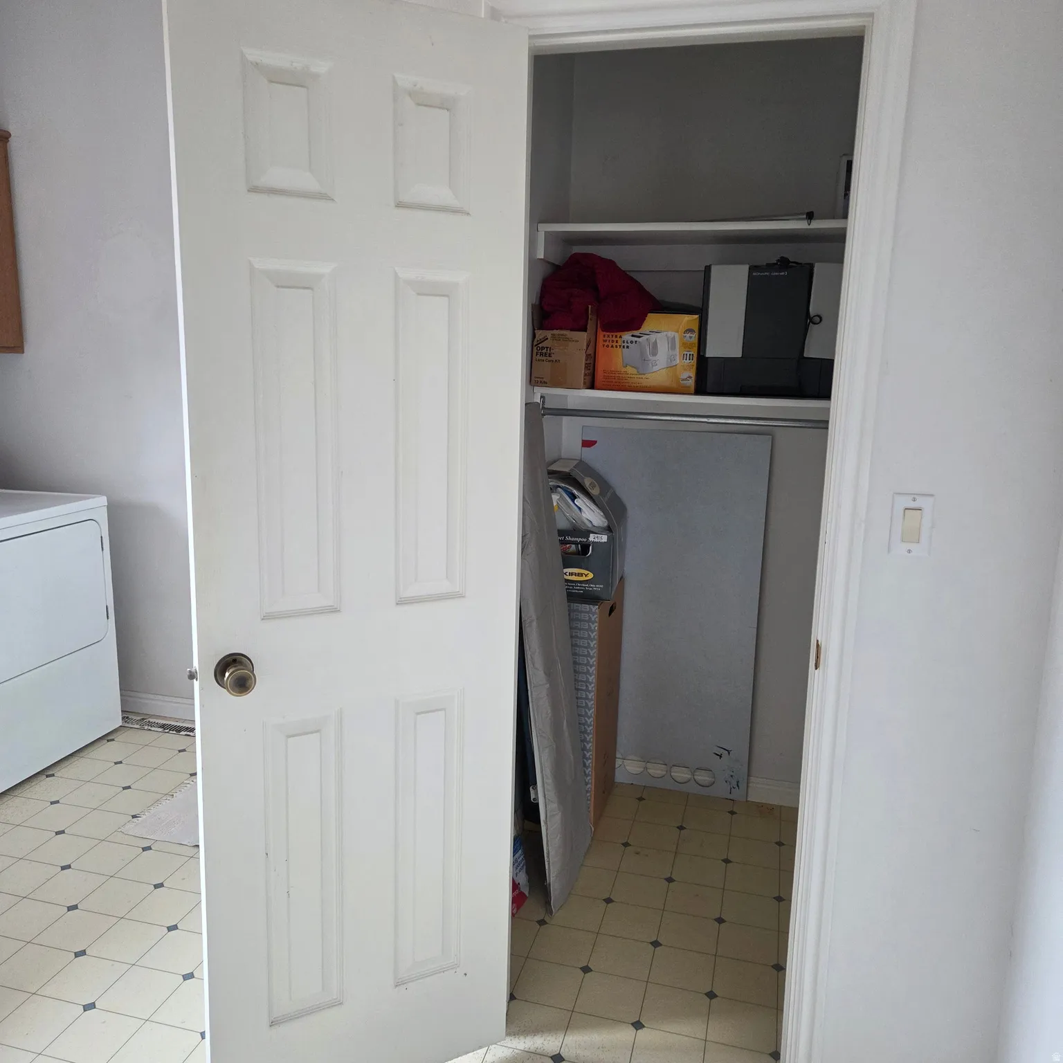 Laundry room featuring light flooring and washer / dryer