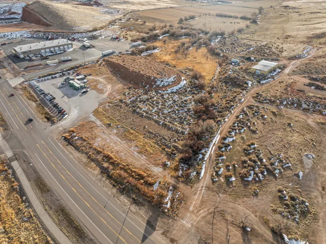 Aerial view of property and surrounding area with rural landscape