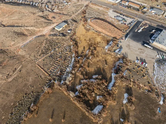 Aerial view of property's location with a desert landscape and rural landscape