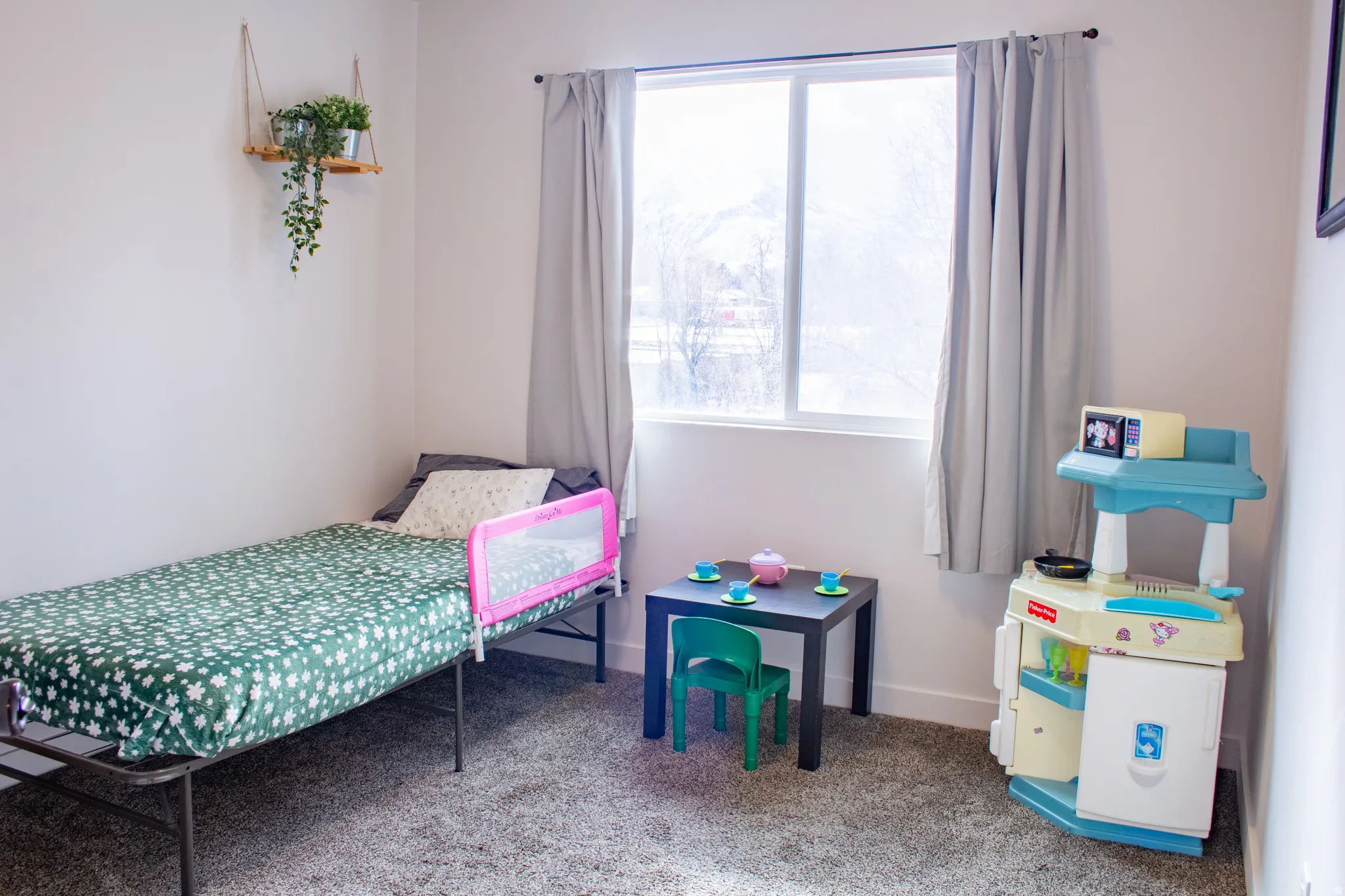 Bedroom  #1 carpet flooring and Large windows