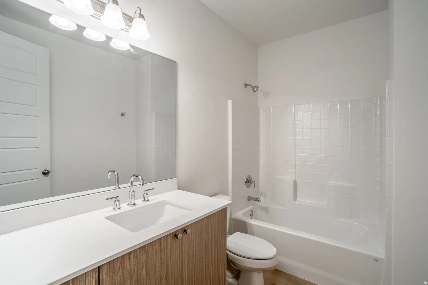 Bathroom with tub / shower combination and vanity