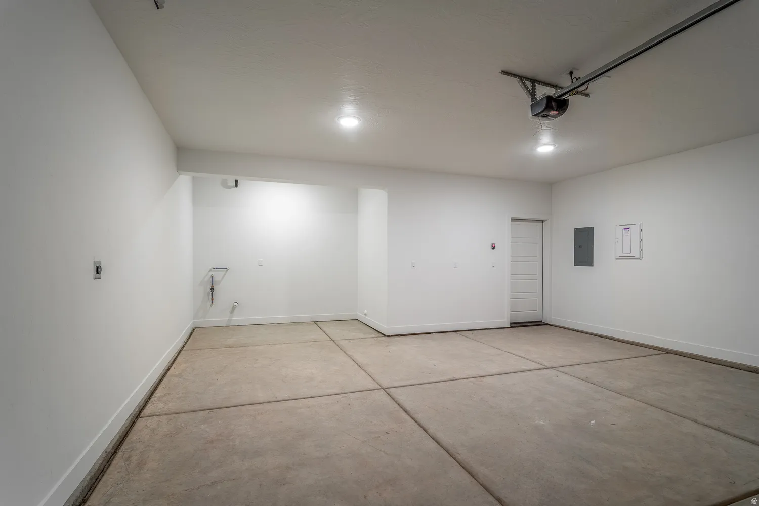 Garage featuring electric panel