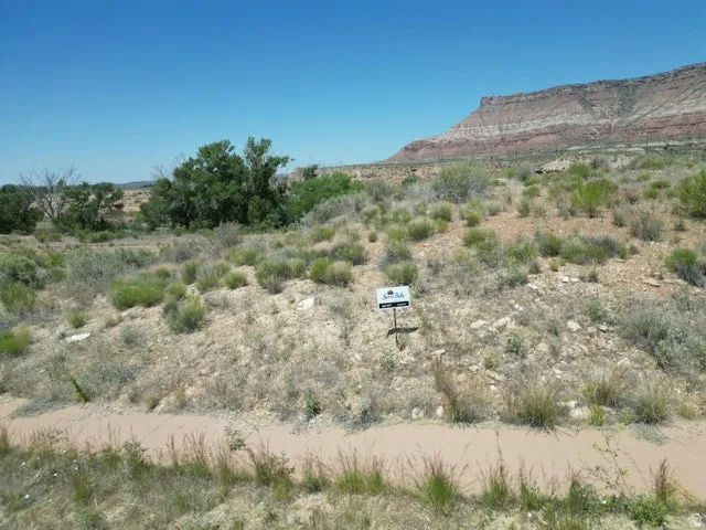 View of mountain backdrop featuring rural landscape
