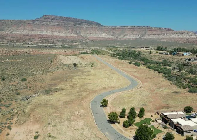 Aerial view of sparsely populated area with mountains