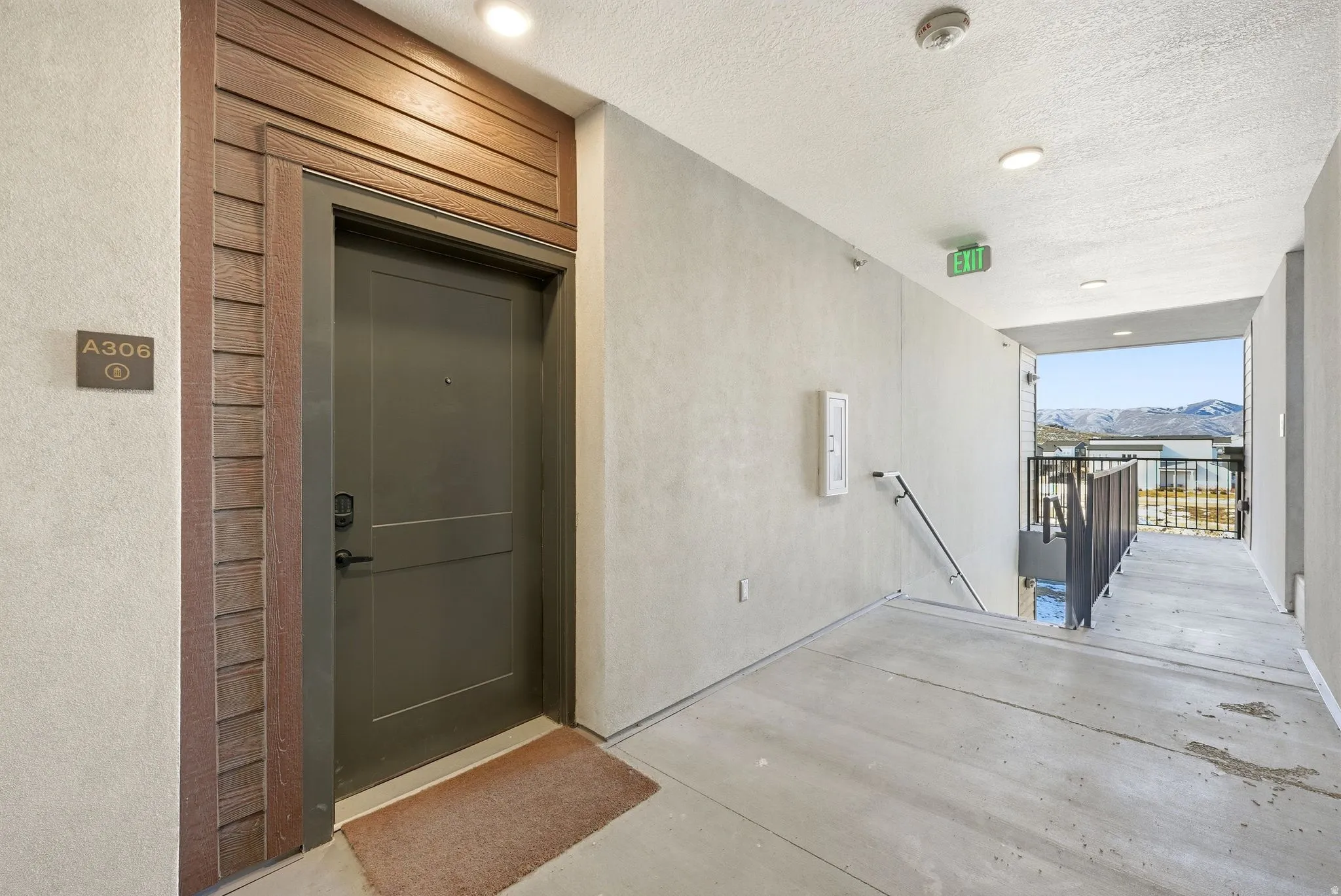 View of exterior entry featuring a mountain view