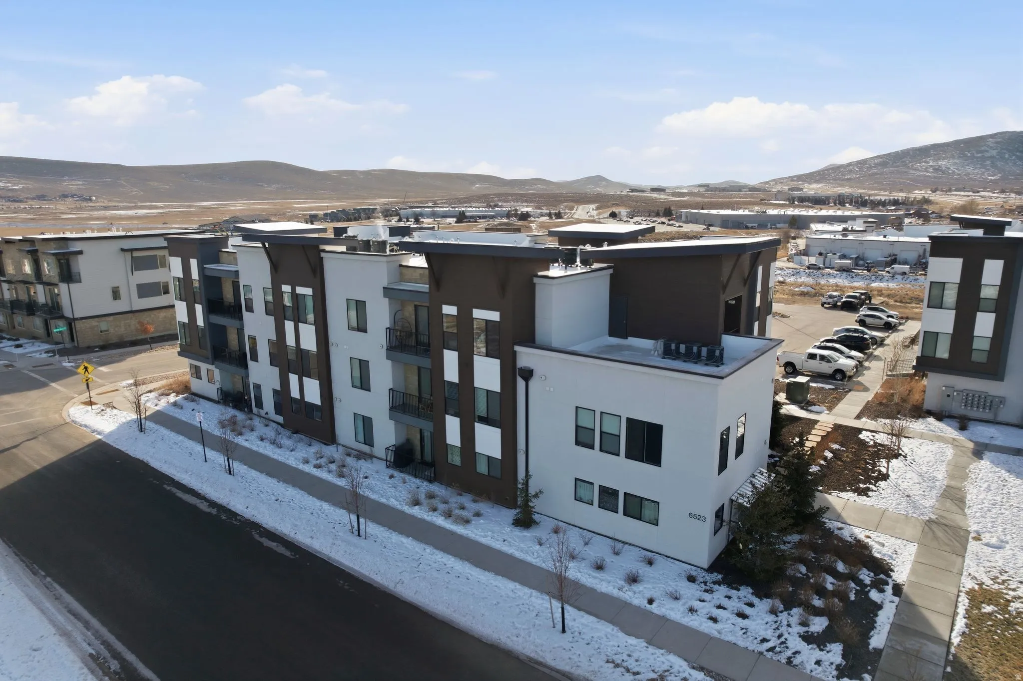 View of property with a mountain view