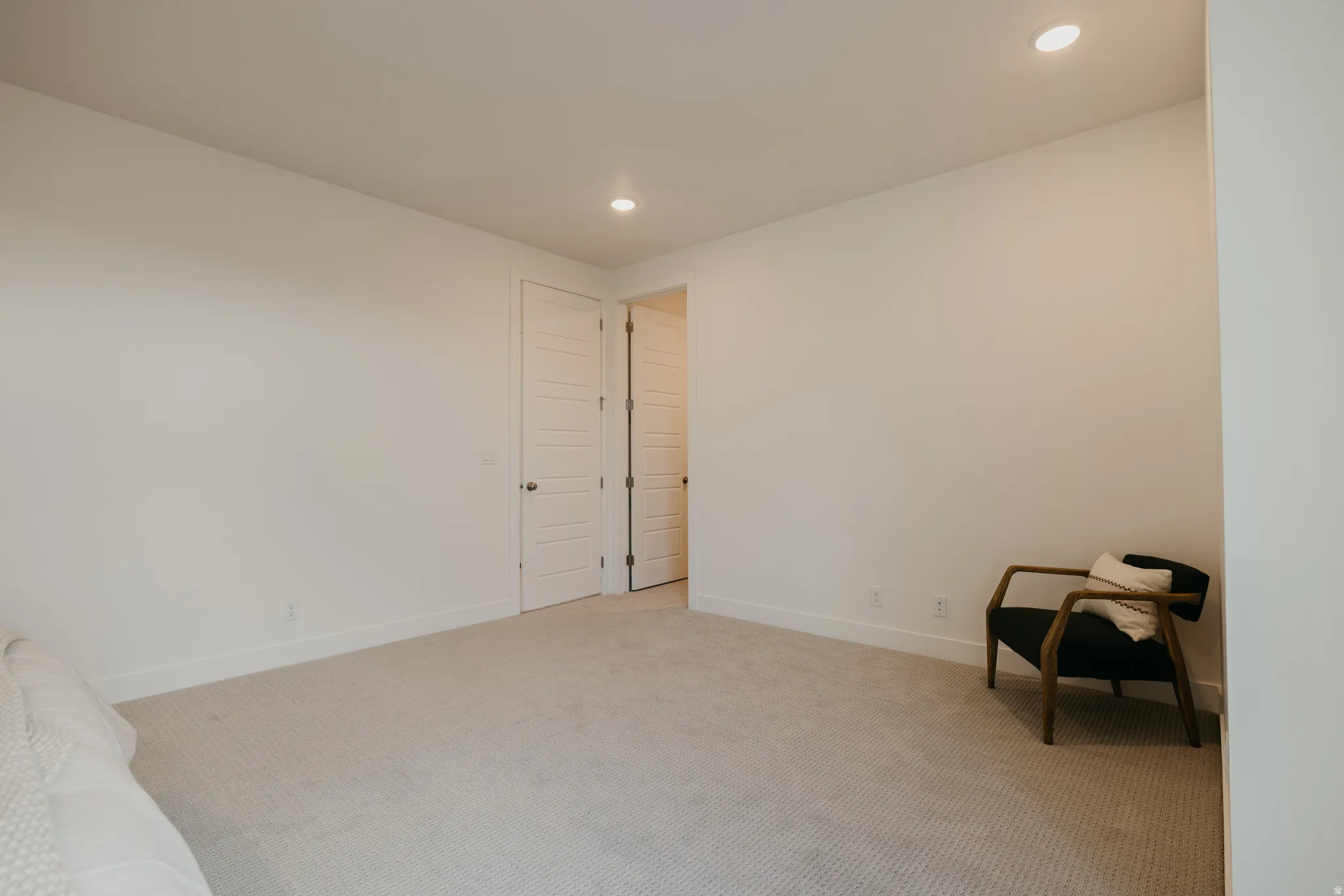 Unfurnished room with carpet floors and recessed lighting