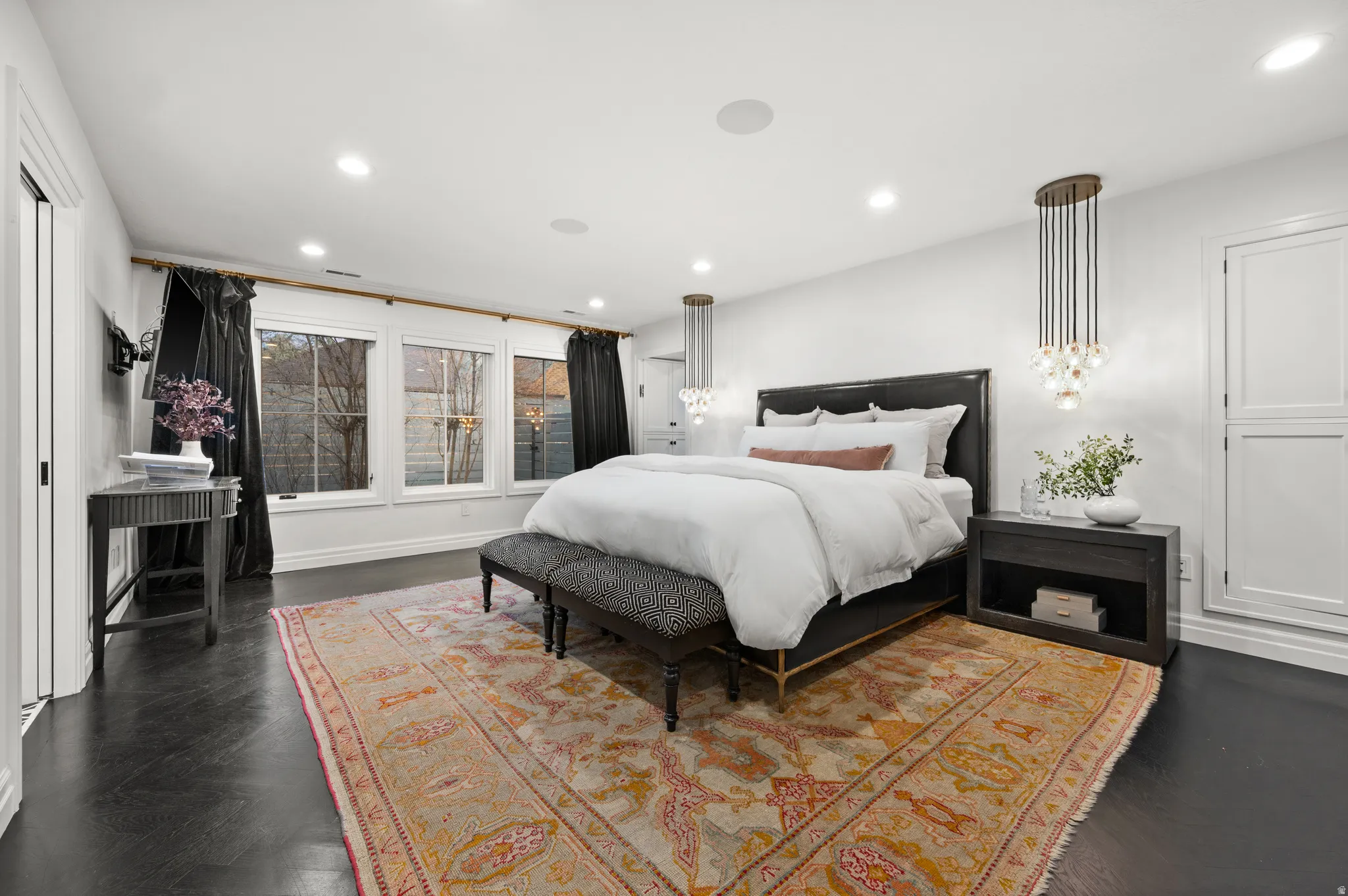 Master Bedroom with recessed lighting and parquet flooring