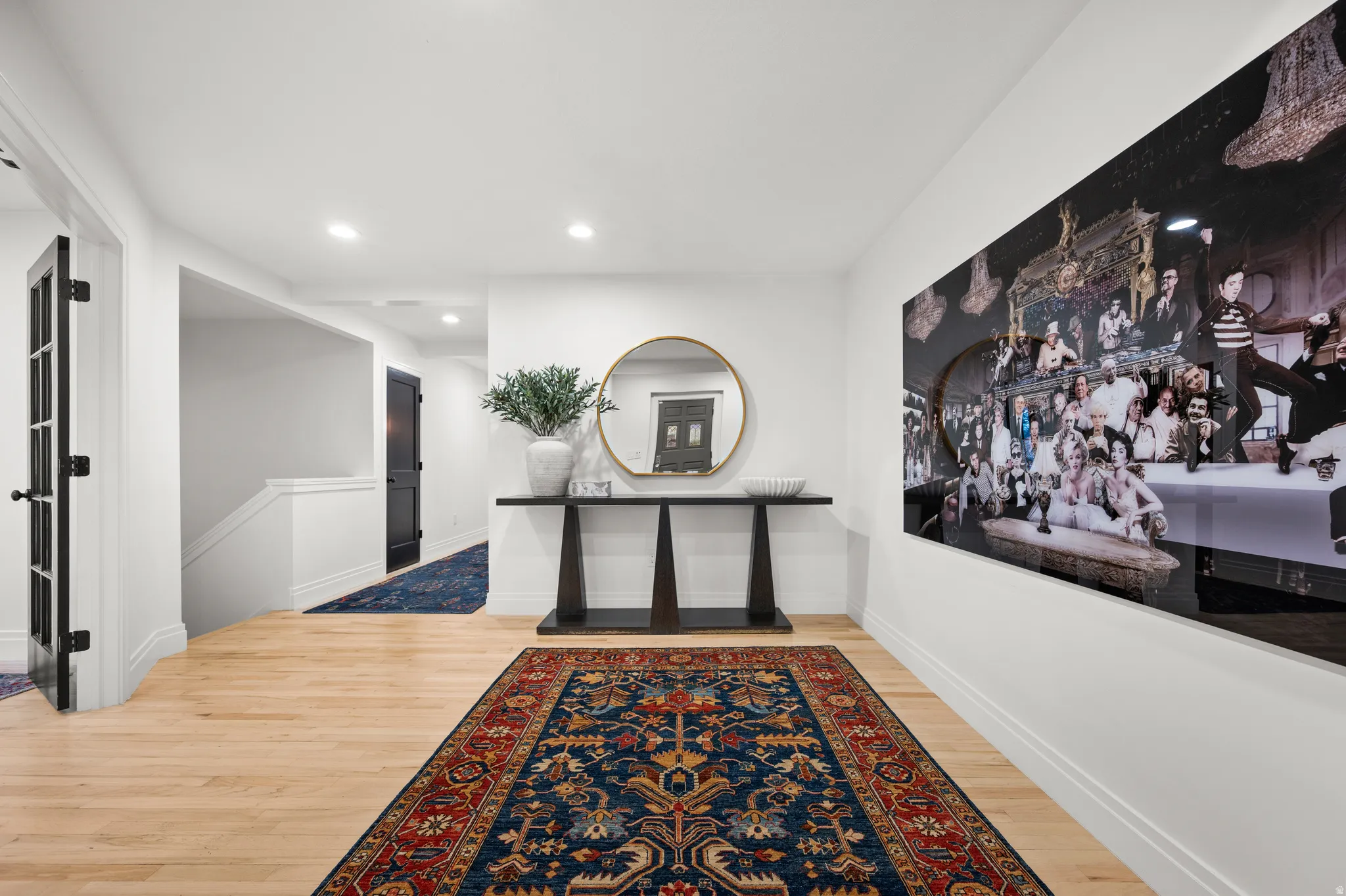 Hall featuring light wood-style flooring and recessed lighting