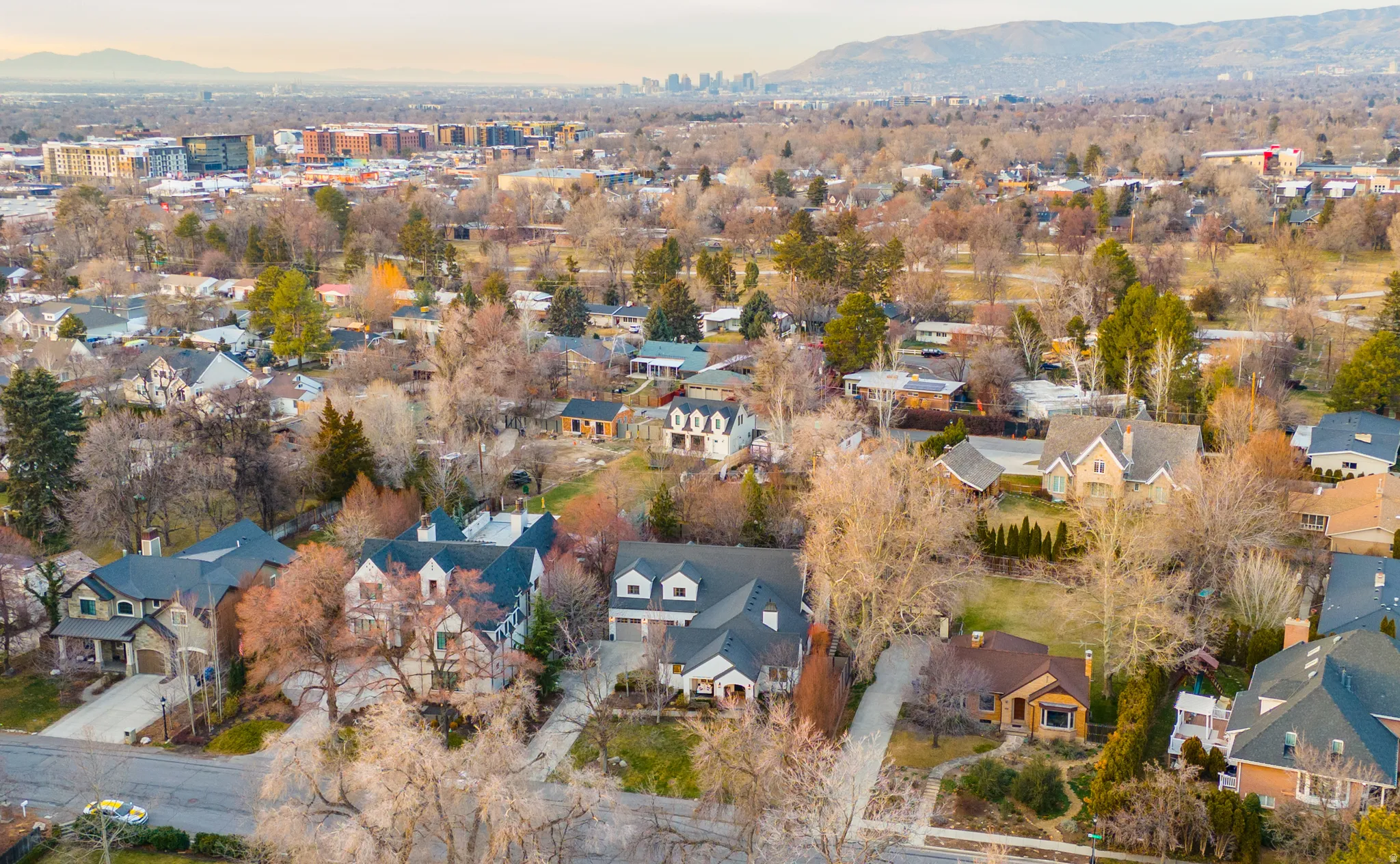 Aerial view at dusk of a mountain view and a residential view