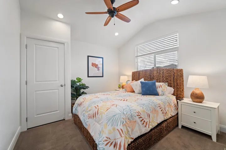 Bedroom with Vaulted Ceilings & a TV