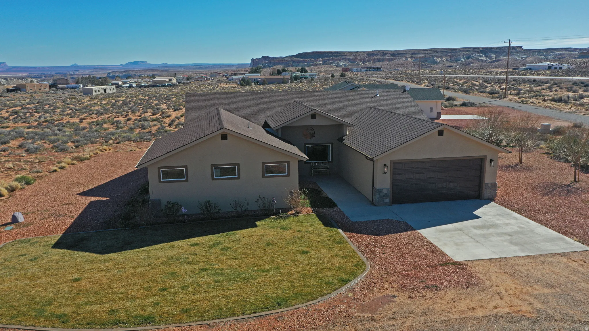 View of subject property featuring mountains