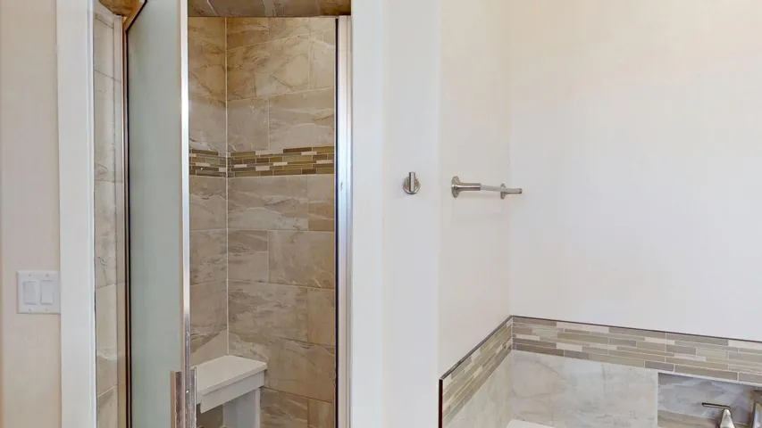 Bathroom featuring a shower stall