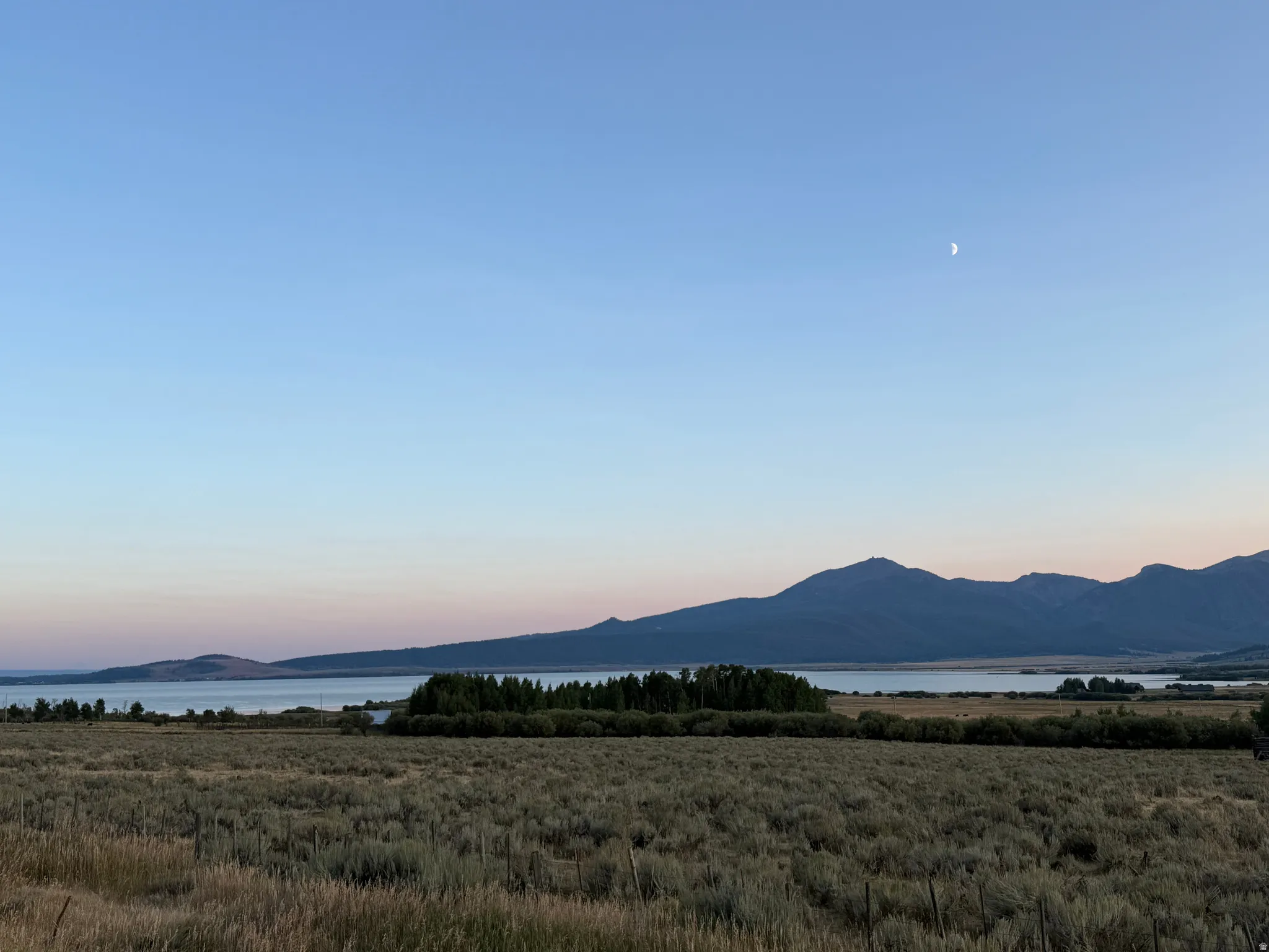 View of mountain background featuring a large body of water
