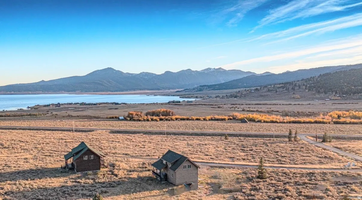 View of mountain backdrop with a large body of water