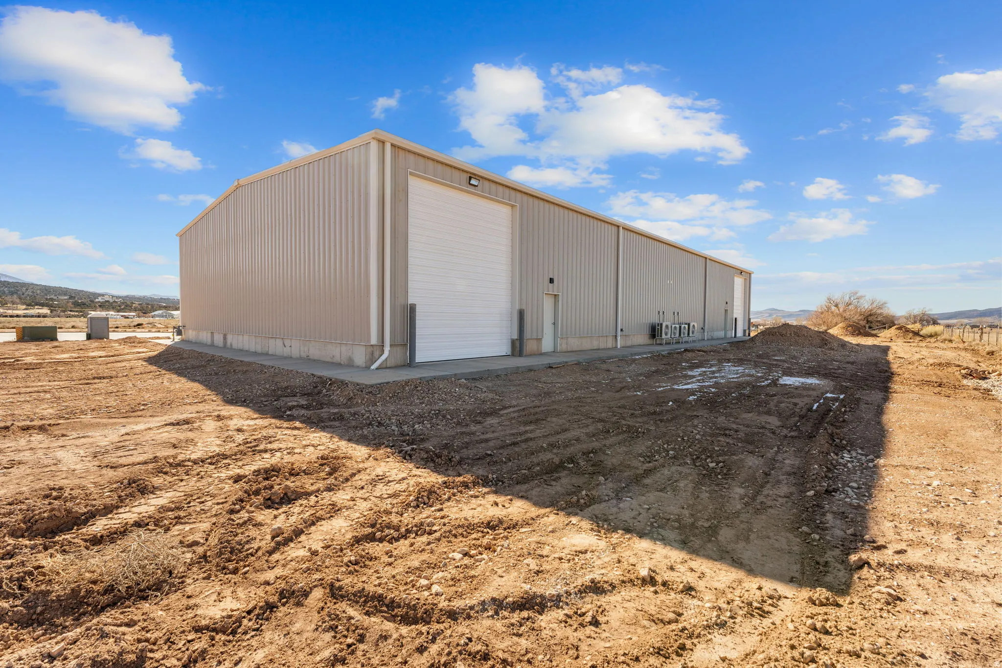 View of outbuilding with a mountain view