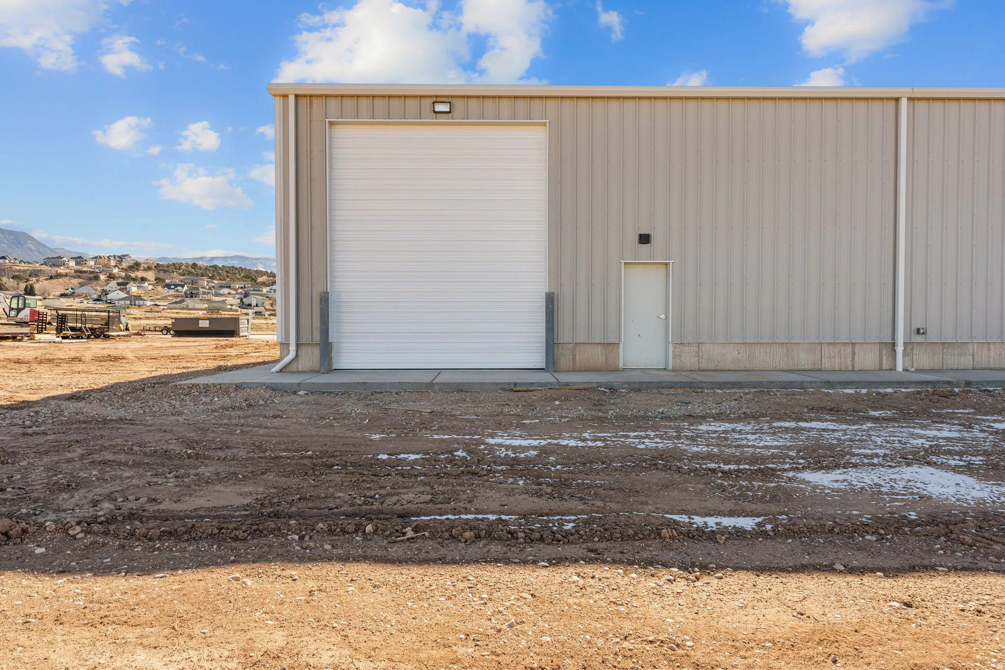 Detached garage with a mountain view