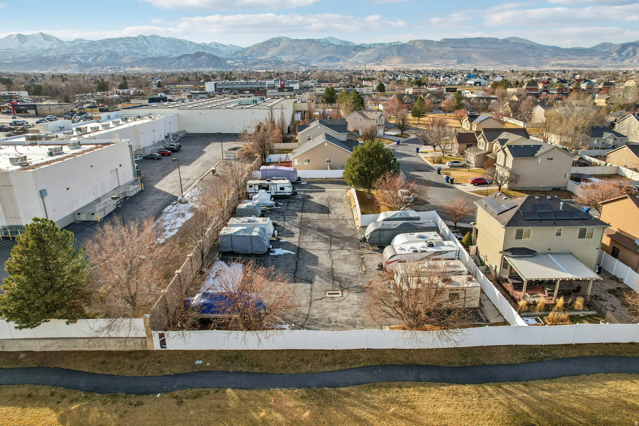 Aerial perspective of suburban area with mountains