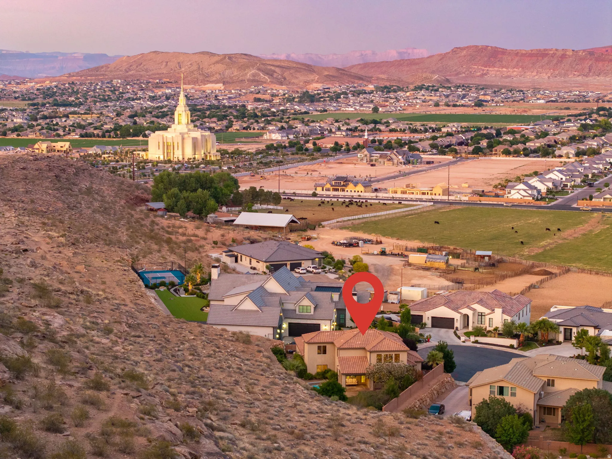 Aerial view of residential area with a mountainous background