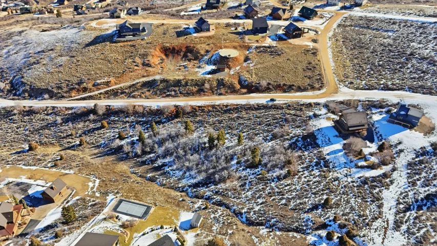 Aerial overview of property's location with nearby suburban area