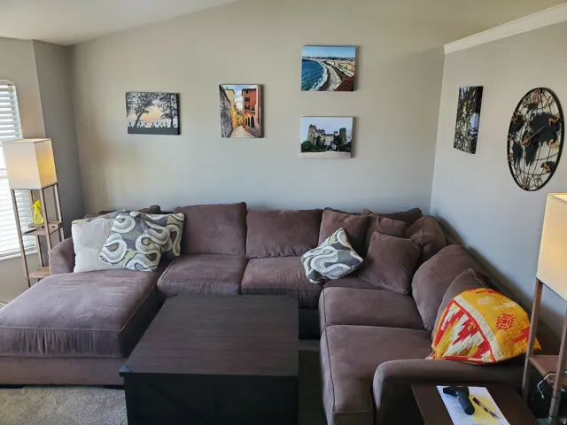 Living room featuring vaulted ceiling
