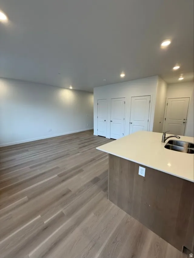 Kitchen featuring recessed lighting and light wood finished floors
