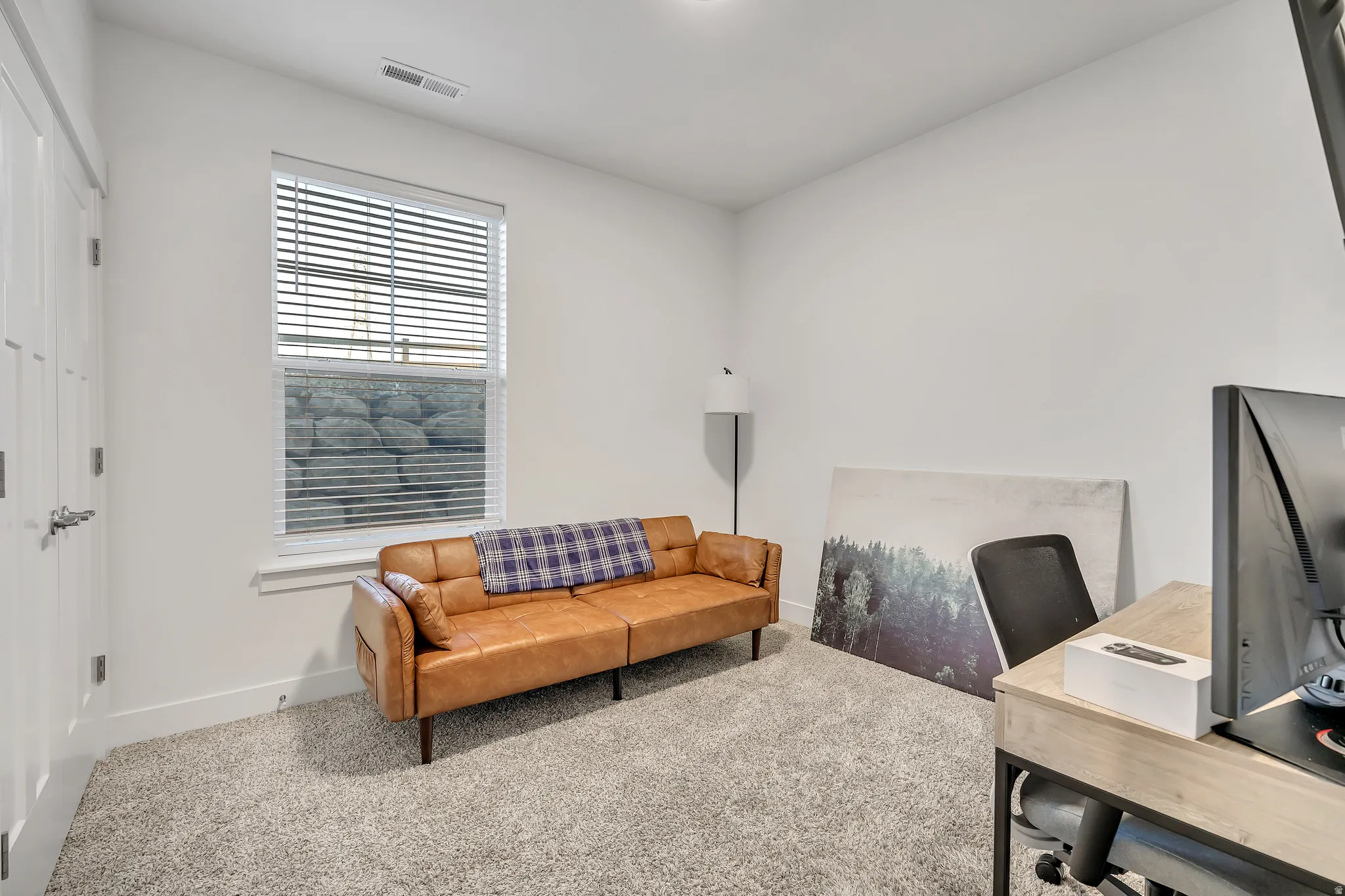 Office featuring carpet flooring and baseboards