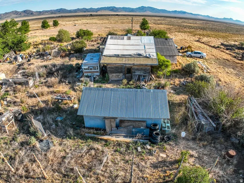 Overview of rural landscape with a mountain backdrop