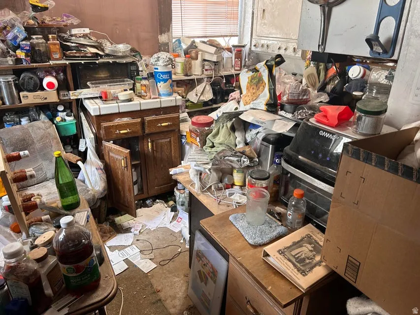 Kitchen with dark brown cabinets