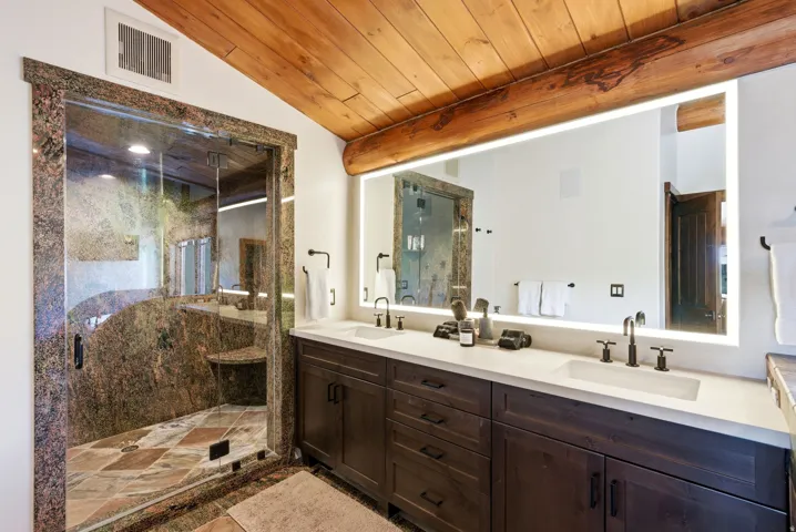 Dual vanity with integrated sinks and matte black fixtures