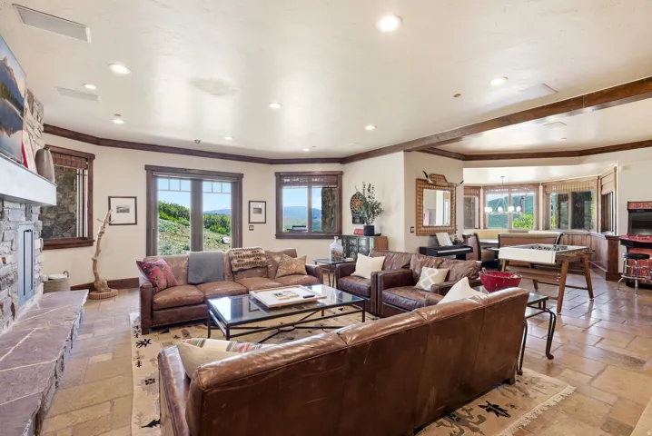 Spacious interior featuring stone tile flooring throughout