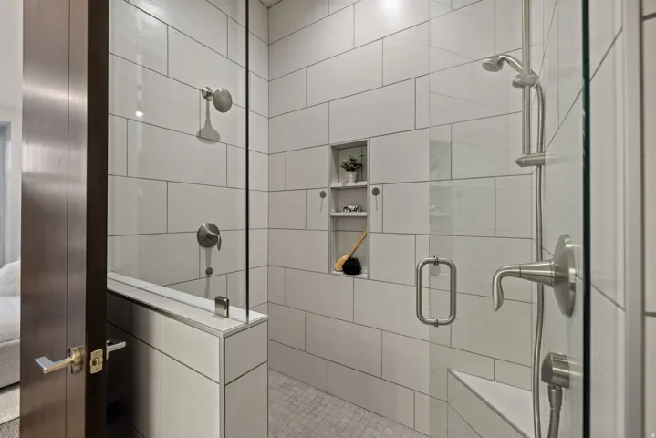 Bathroom featuring a shower stall