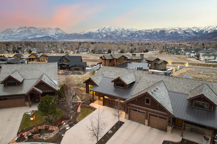 Aerial view of residential area with a mountainous background