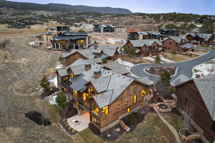 Aerial view of residential area featuring mountains