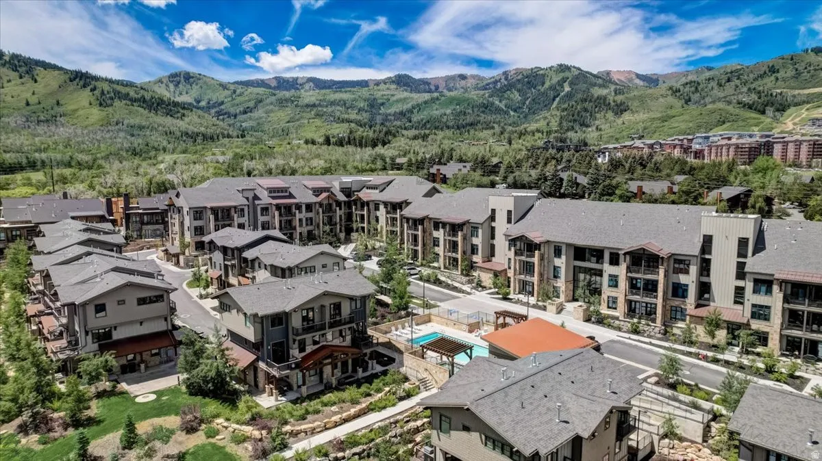 Aerial perspective of suburban area featuring mountains