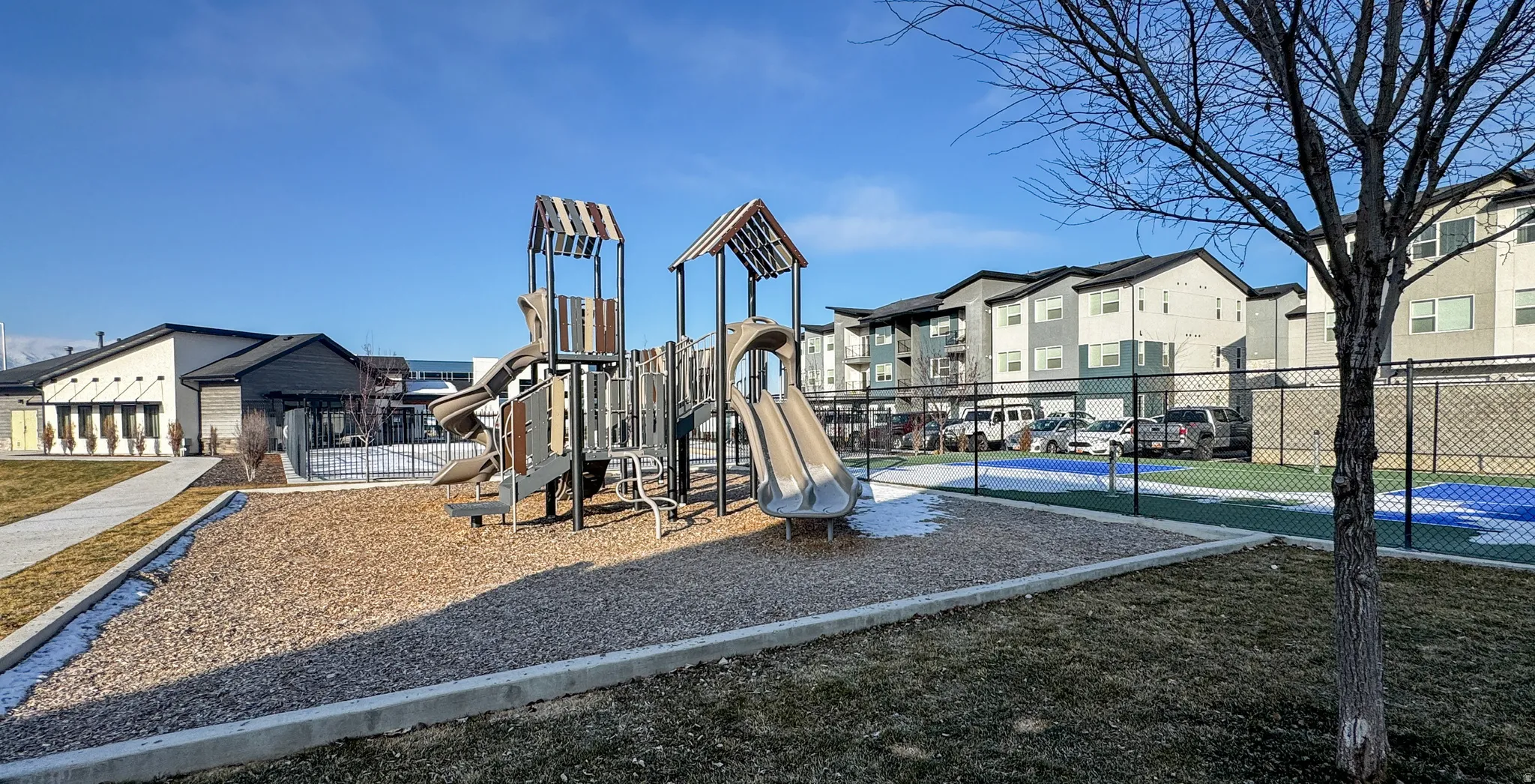 Communal playground with a residential view