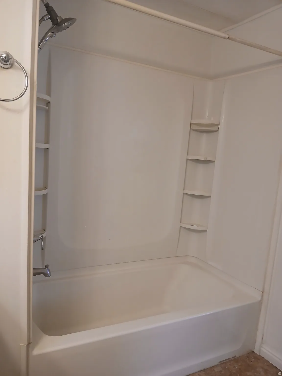 Full bath featuring washtub / shower combination