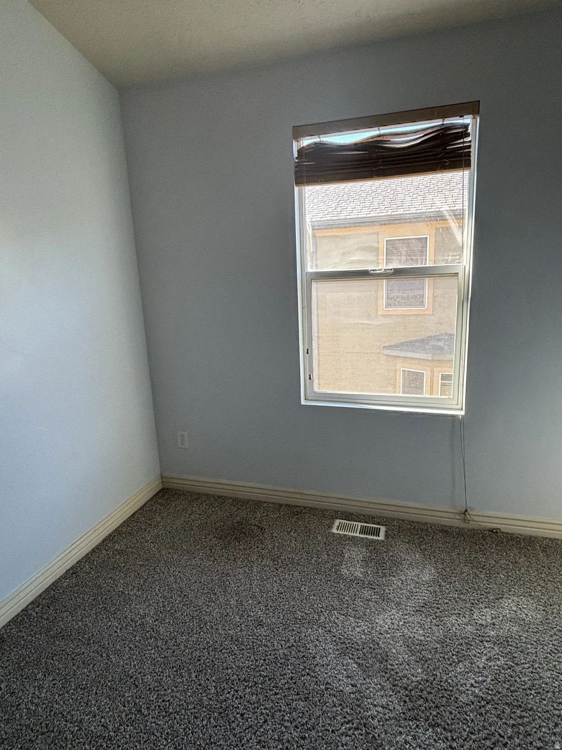 Bedroom  featuring carpet floors and baseboards
