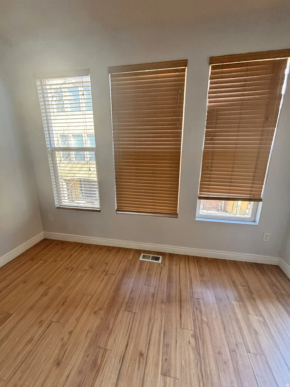 Spare room with light wood finished floors