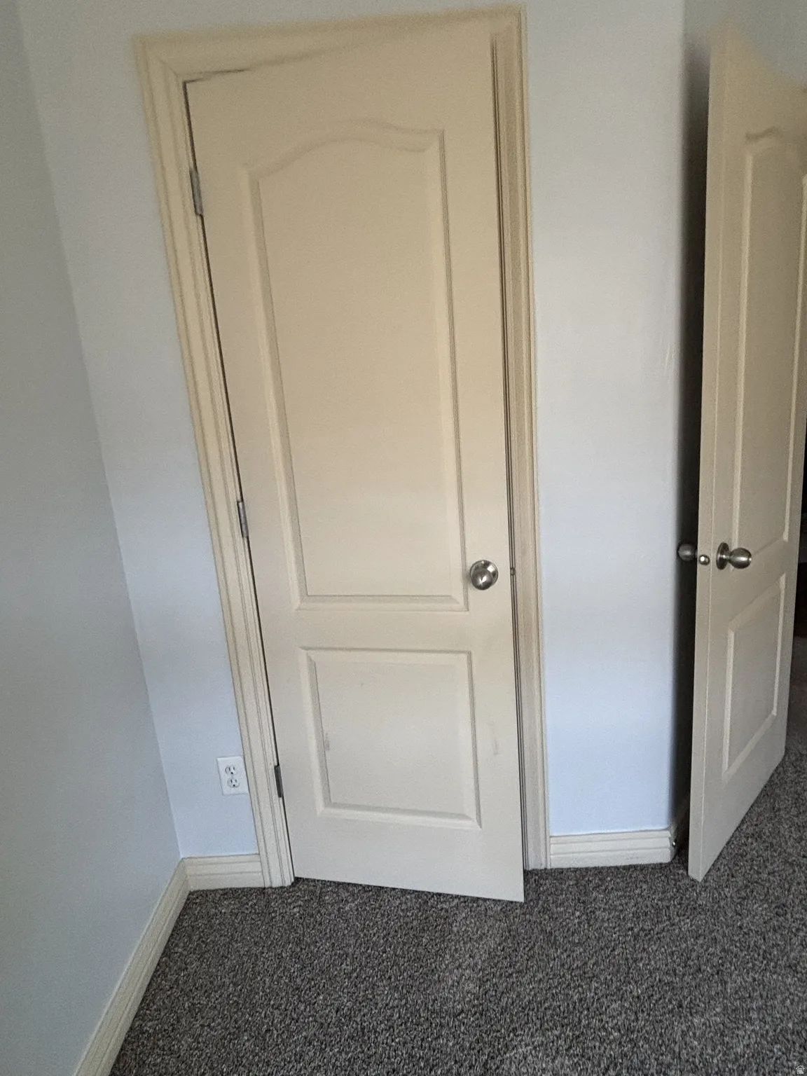 View of closet in bedroom