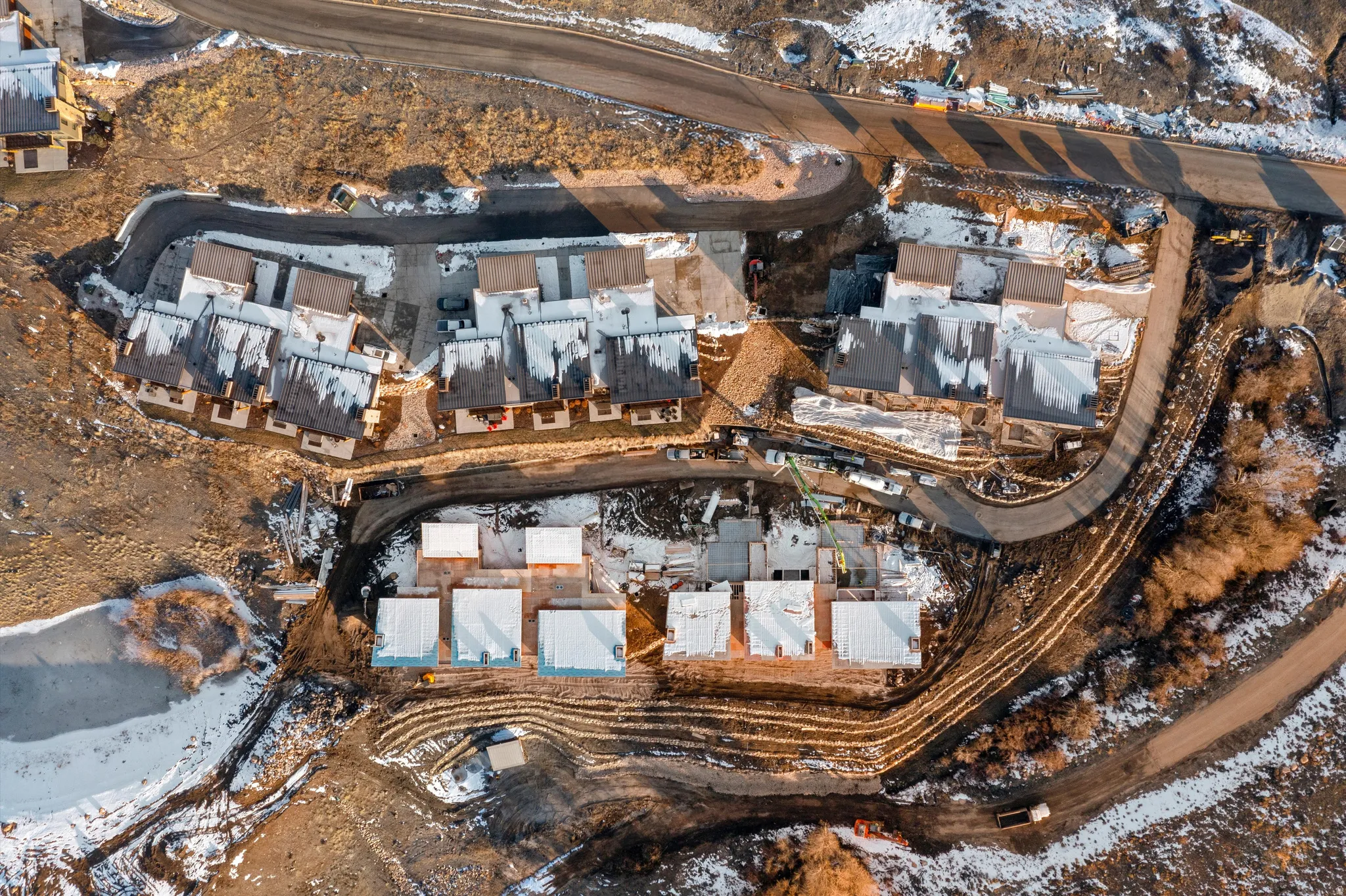 Snowy aerial view with a residential view