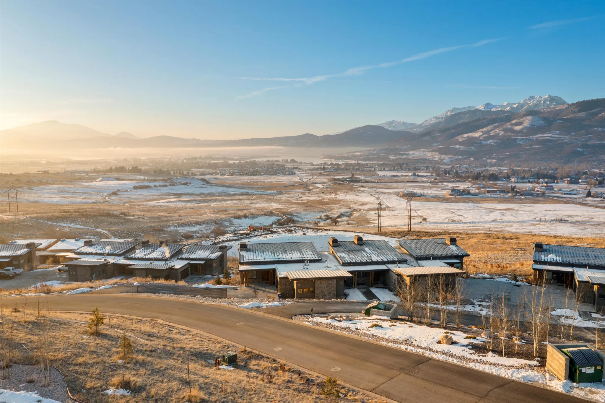 View of mountain backdrop with nearby suburban area
