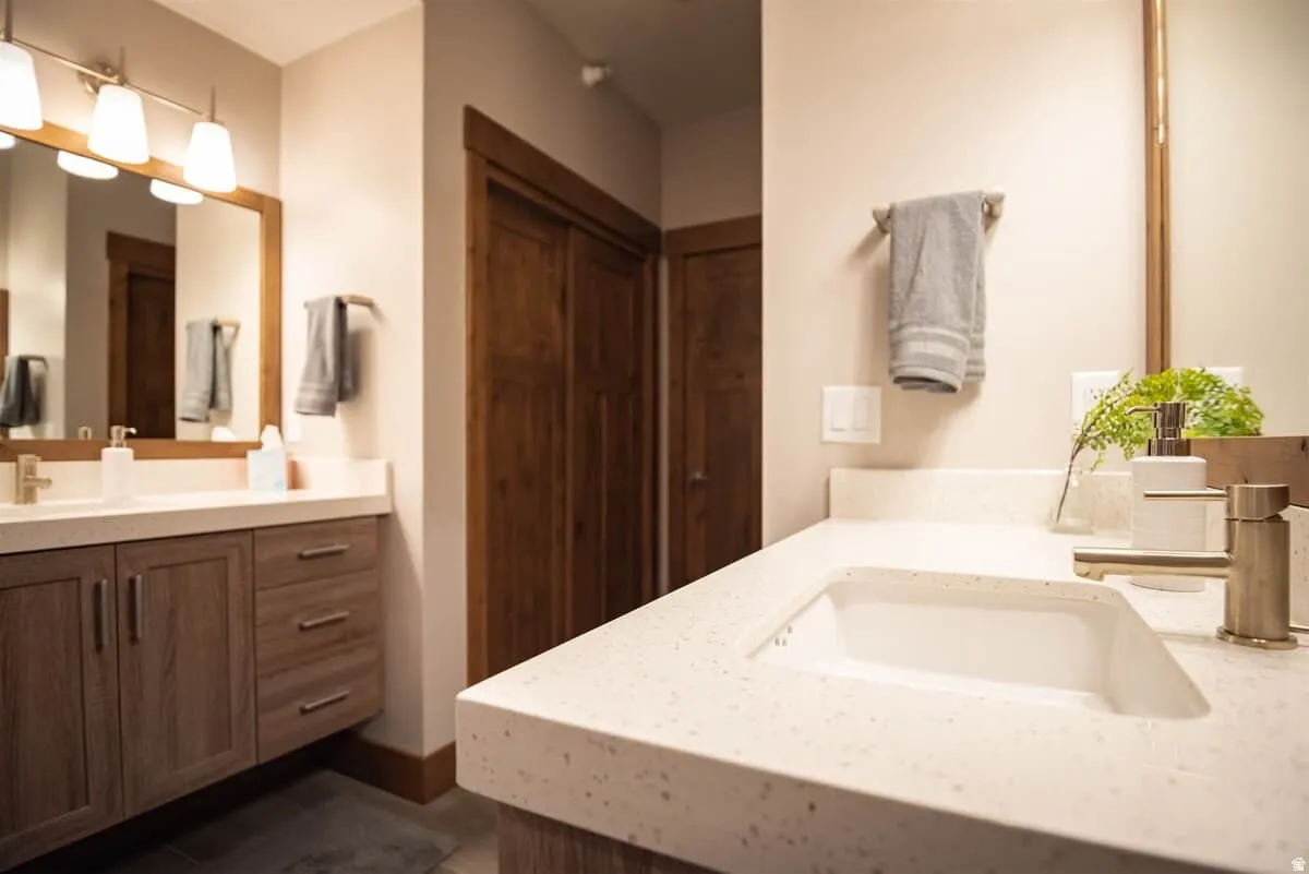 Bathroom featuring two vanities