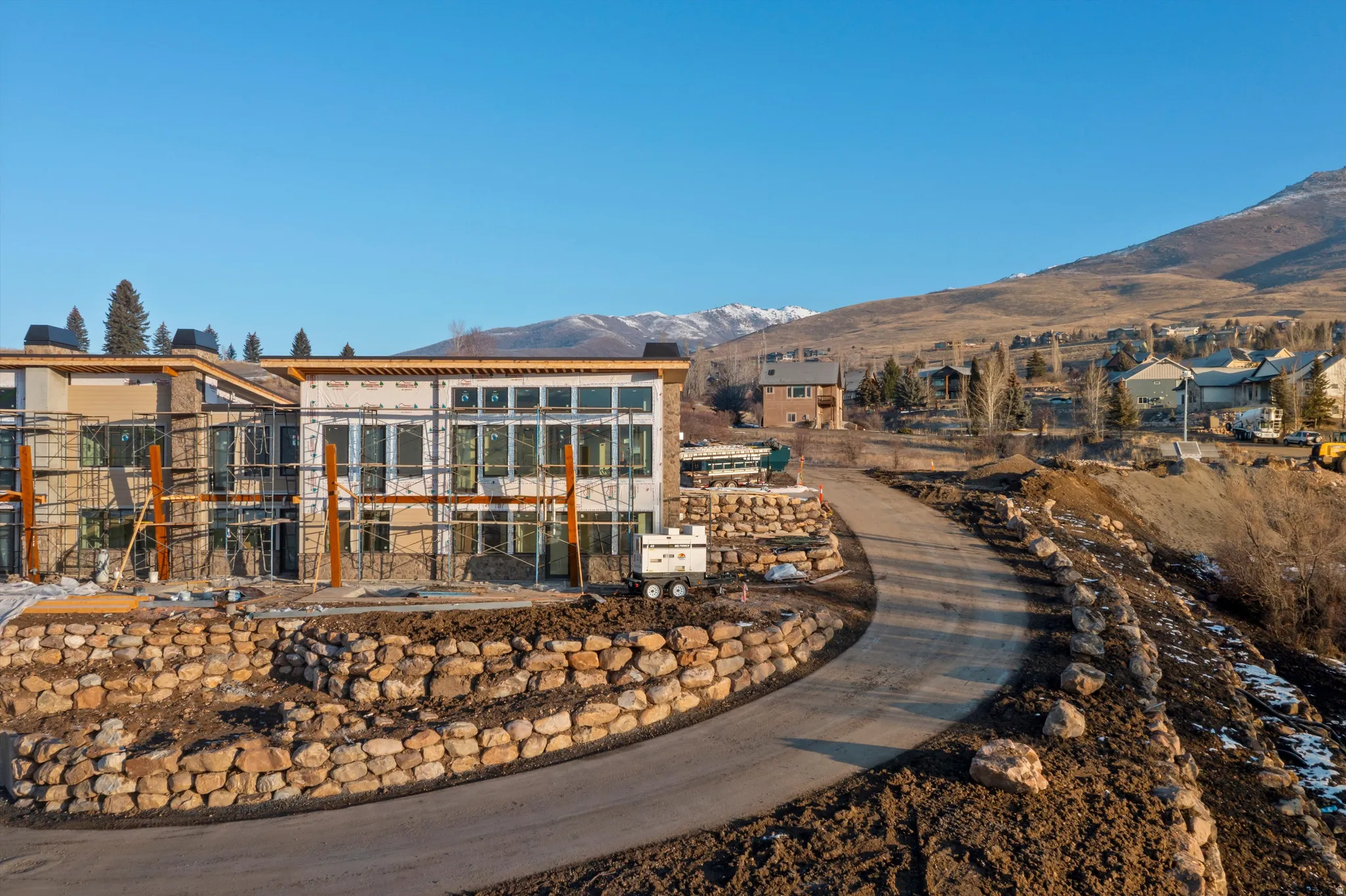 Rear view of house featuring a mountain view