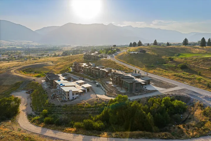 Developing community featuring contemporary multi-story residences