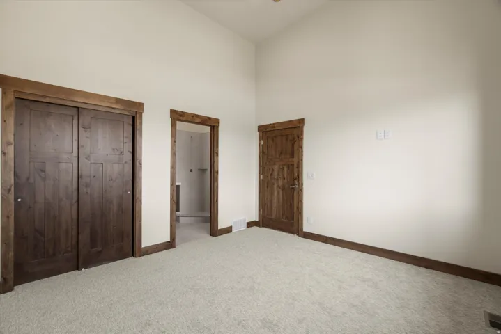 Vaulted ceiling with light-colored walls