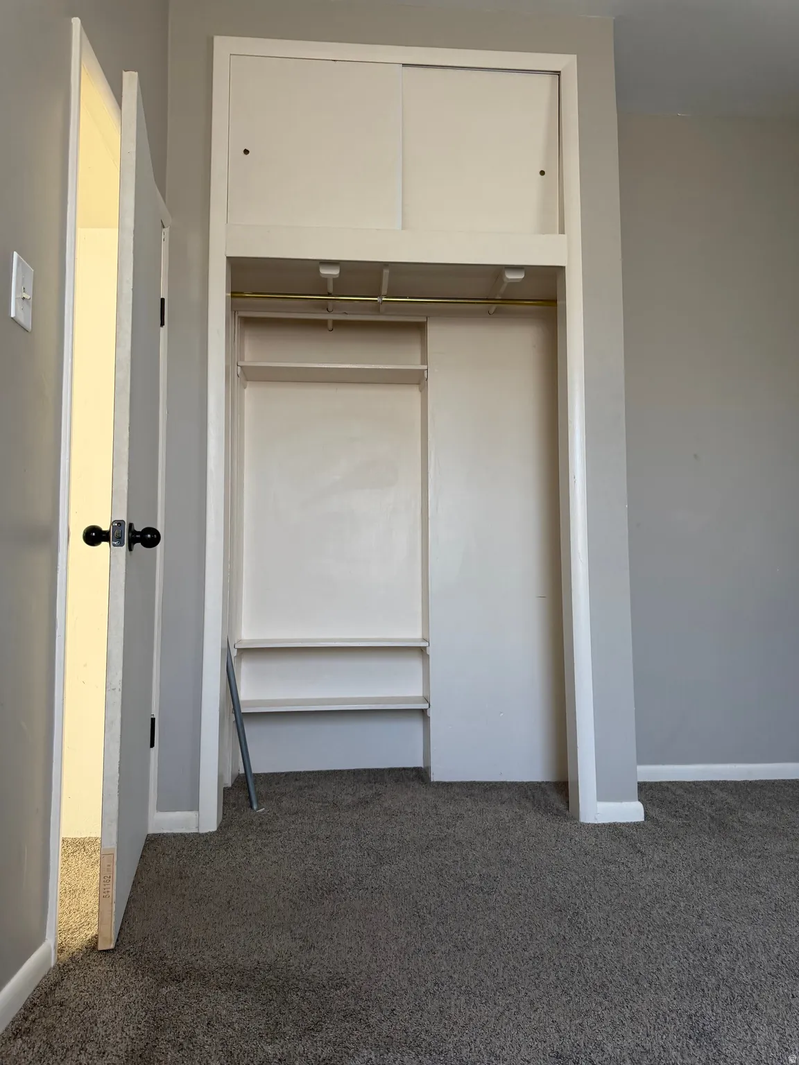 View of closet in bedroom on main level.
